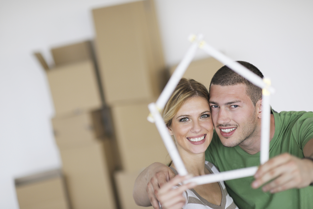 happy Young couple moving in new home